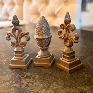 Brown Decorative Accents with Fleur-de-Lis and Pinecone Designs